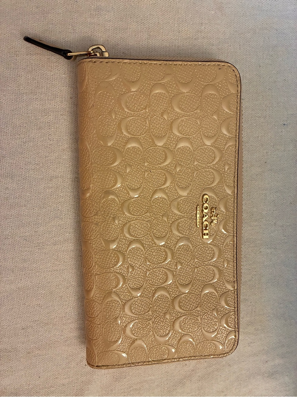 Coach Gold Embossed Signature Zip Around Wallet
